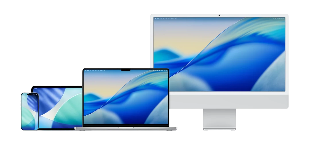 An iPhone, an iPad, a MacBook Pro and an iMac side by side, the family of devices an MDM manages from a single console