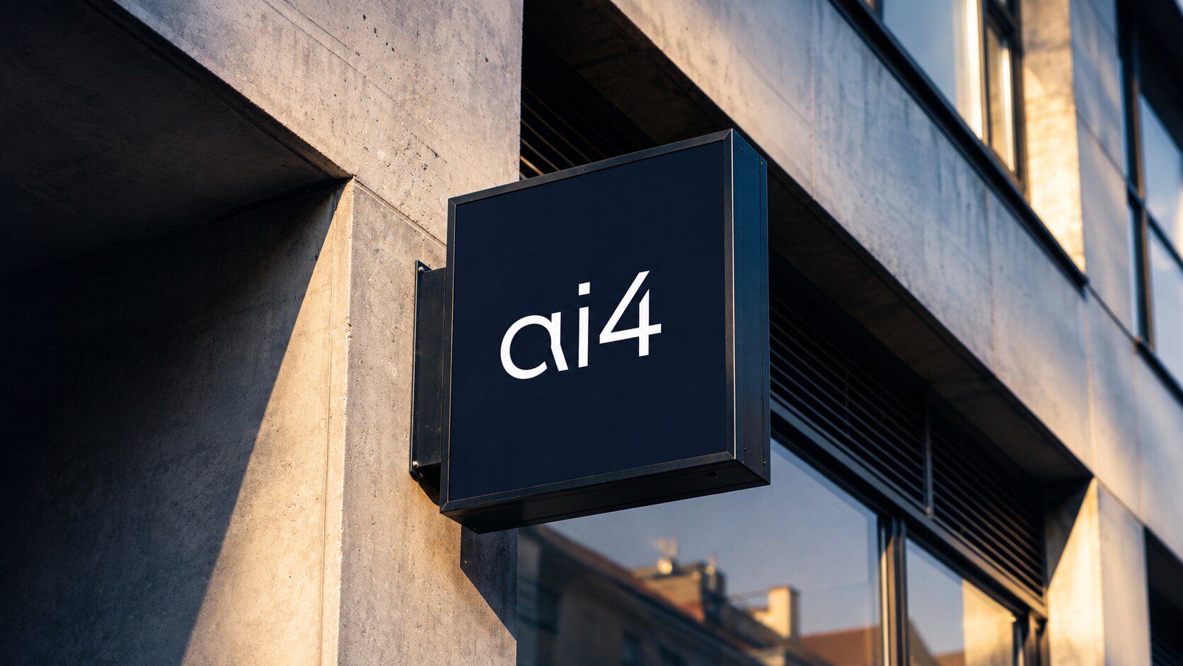 ai4 Architecture sign on the concrete facade of a building